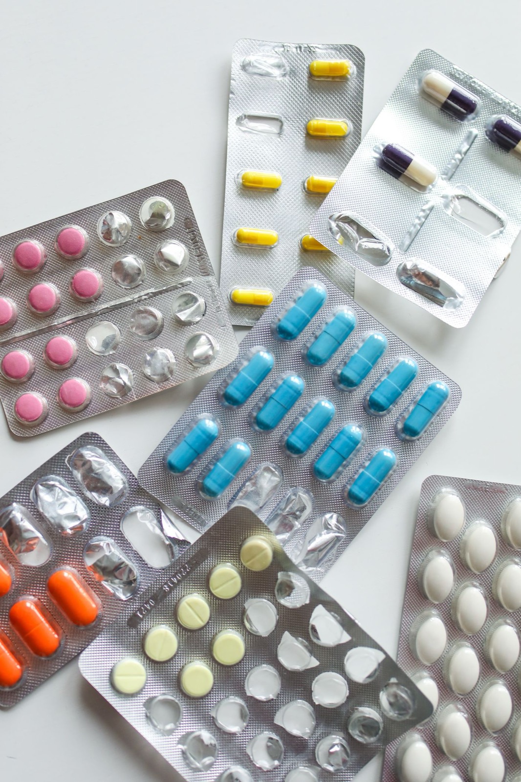 Assorted tablets and capsules in blister packs